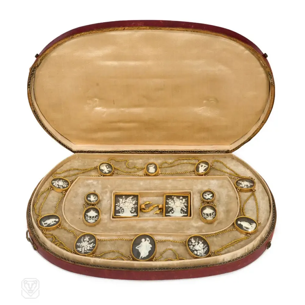 Georgian carved bone, ebony, and gold demi-parure