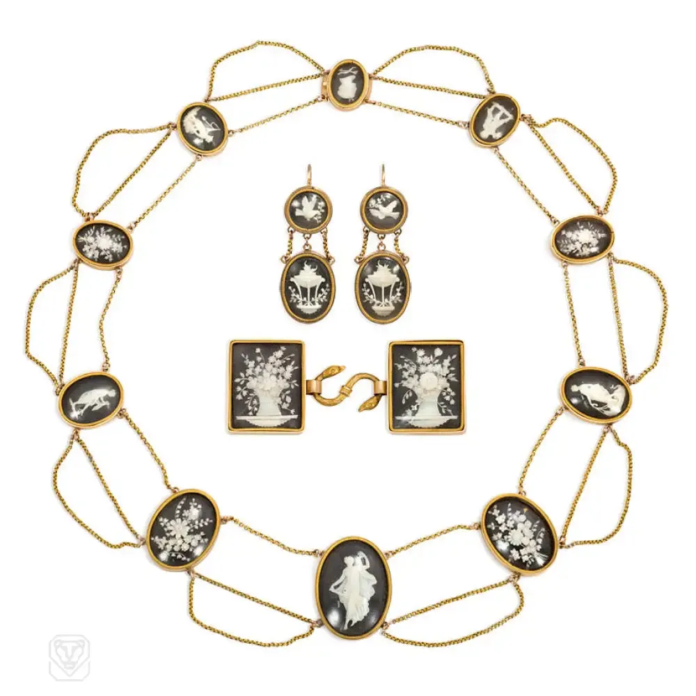 Georgian carved bone, ebony, and gold demi-parure